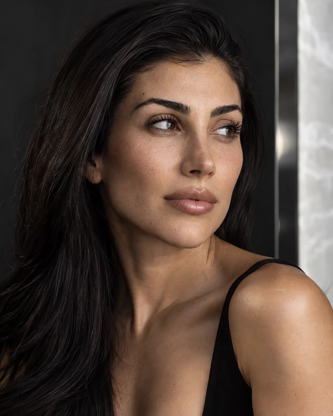 Editorial portrait emphasizing natural expression and upper-face detail